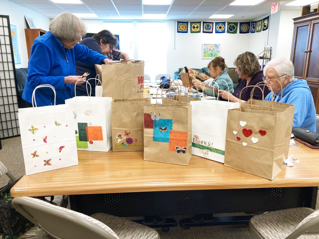 Wholly Crones group assembling Comfort Kits for Planned Parenthood in Pullman